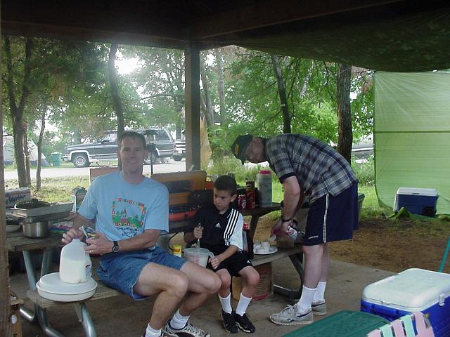 Steve and Andrew Mills and Van Johnson preparing breakfast.jpg